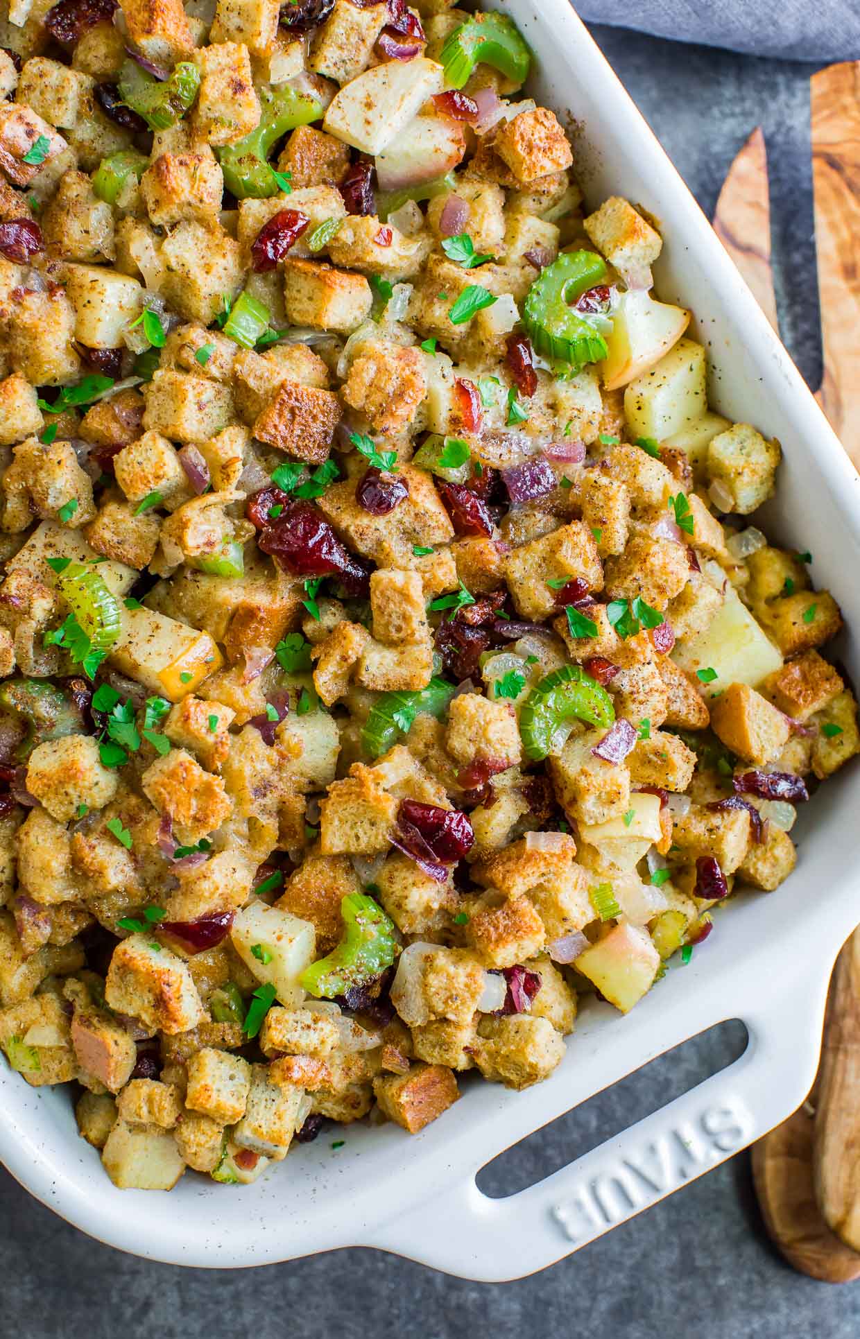 This sweet and savory baked apple cranberry stuffing combines the best of both worlds! Sweet apples and cranberries kissed with cinnamon and baked into a warm Thanksgiving stuffing... it's DELICIOUS.