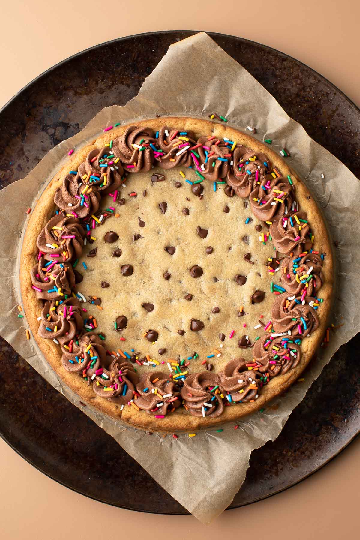 Homemade Cookie Cake with Chocolate Fudge Frosting and Sprinkles