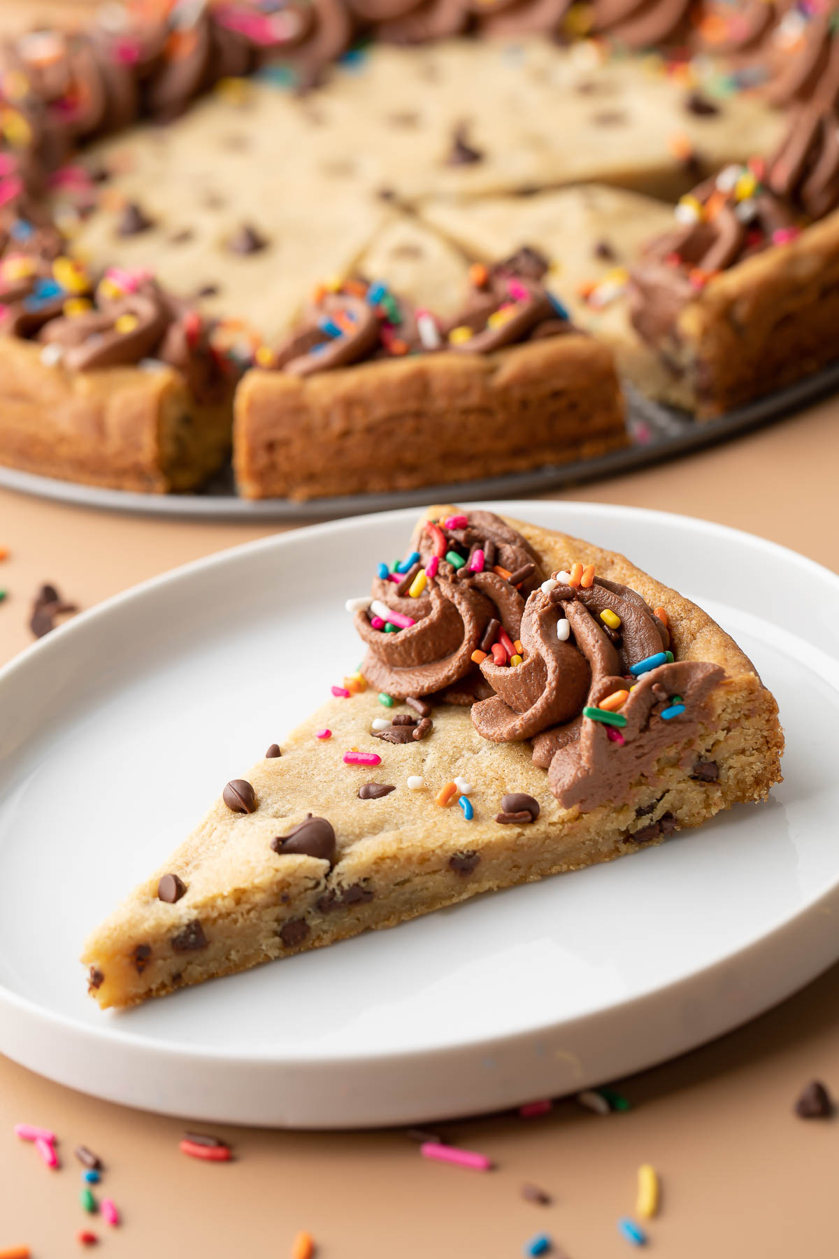 Plated Cookie Cake Slice with Frosting and Sprinkles