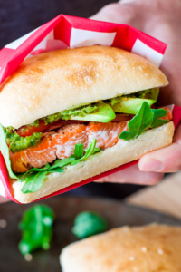 Tips for perfect grilled salmon and a recipe for my favorite Grilled Salmon Sandwiches with pesto, avocado, and arugula: a tasty and healthy Summer sandwich!