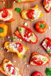 Quick, easy, and totally tasty, these healthy hummus stuffed peppers are sure to be a hit at your next party!