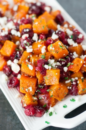 Honey Roasted Butternut Squash with Cranberries and Feta - This sweet and savory side dish is perfect for the holidays and loaded with Fall flavor!
