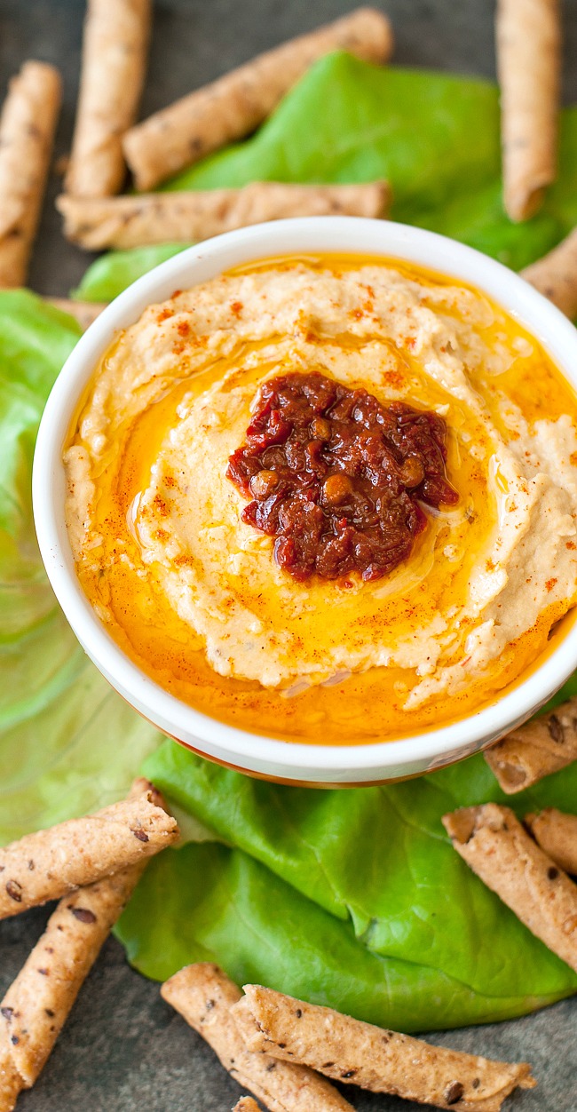This healthy hummus is spiked with smoky chipotle peppers and just the right amount of lemon + garlic to make this addictive dip your new favorite snack! 