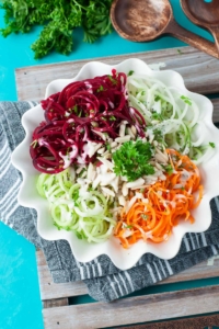 Spiralized Rainbow Veggie Salad - take your veggie noodle game to the next level with beets, broccoli stalk, cucumber, and carrot!