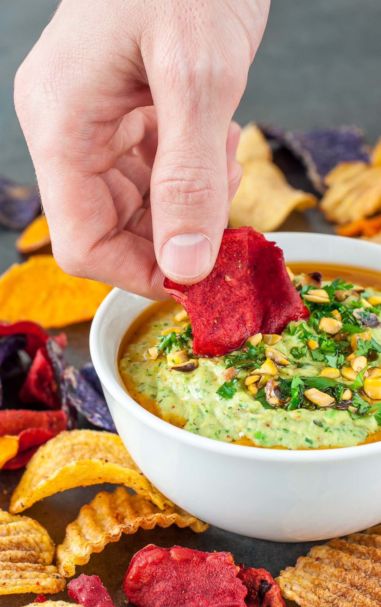 Mix up your dipping routine with this Cilantro Pistachio Hummus! Great for snacking, this gorgeous green hummus is quick, easy, and full of flavor!
