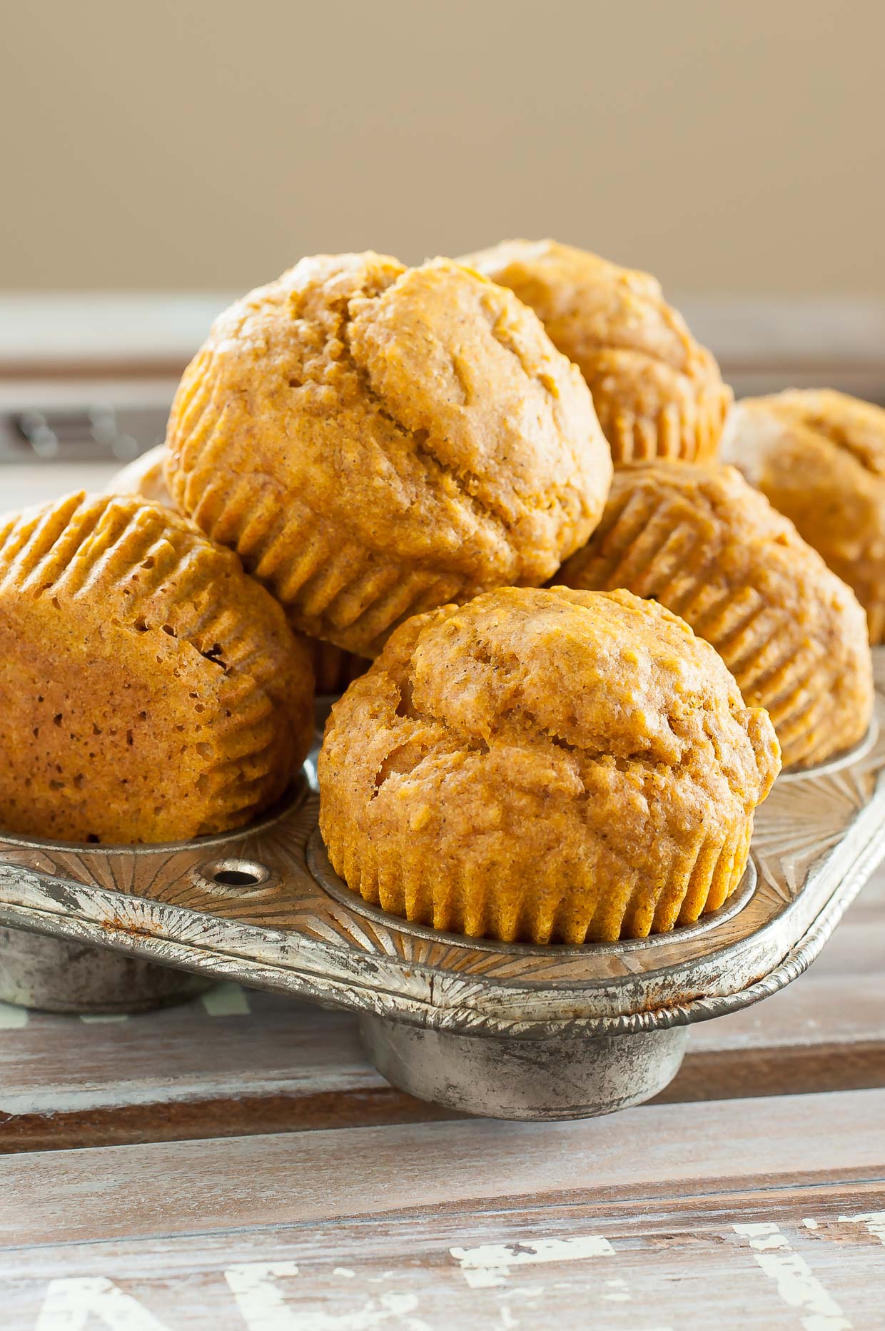 We love making these kid-friendly pumpkin muffins. They're super simple, gloriously healthy, and sweetened naturally with maple syrup!