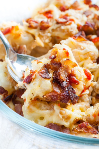 This Bacon Sriracha Cauliflower au Gratin is a spotlight-worthy side that's easy, cheesy, and insanely delicious!