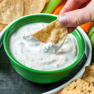 This healthy garden veggie dip is perfect for your next party! Skip the store bought tub; you’ll want to dunk everything in sight into this tasty homemade garden veggie dip! Mayo-free and SO delicious!