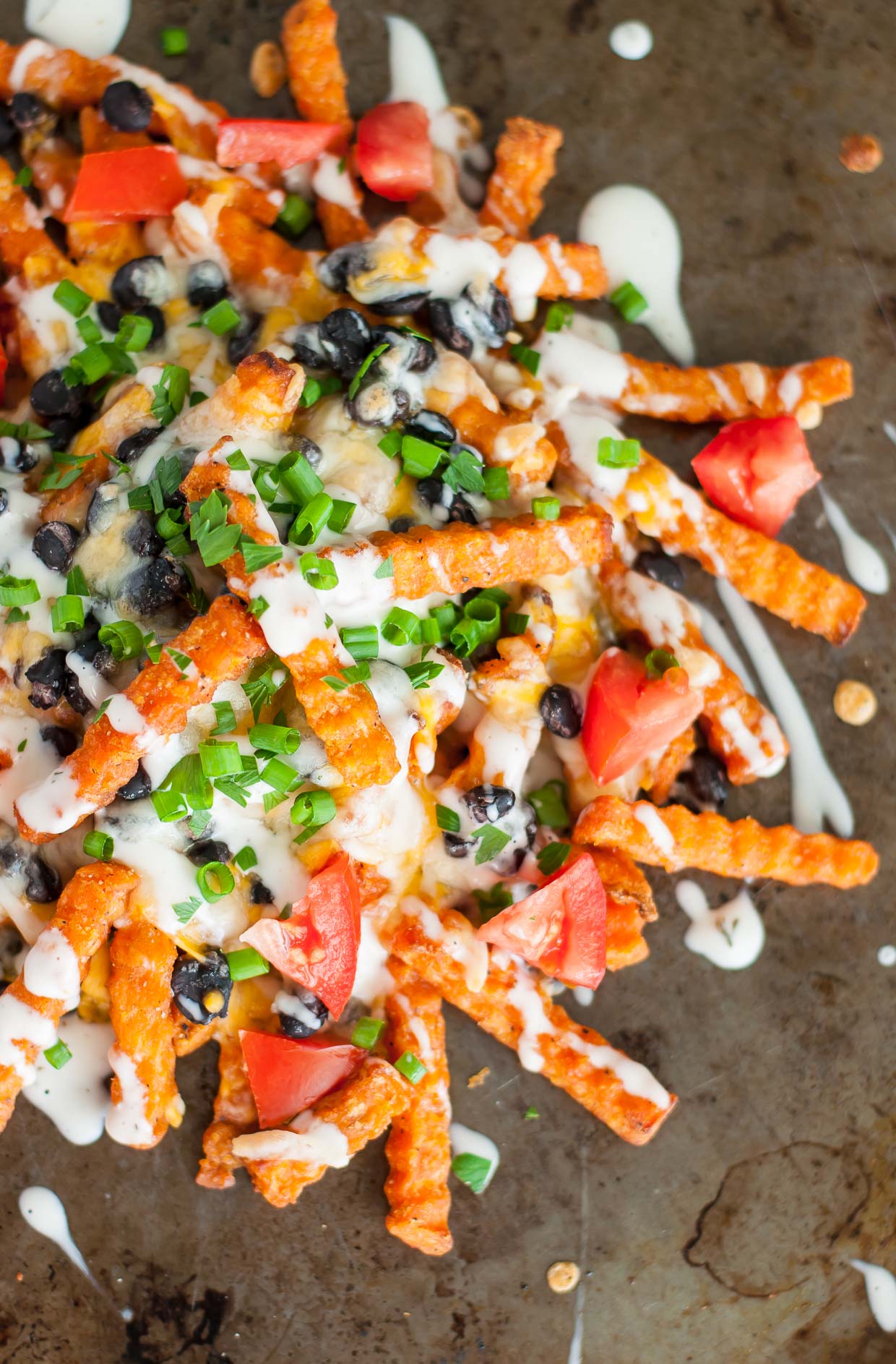 Whenever I have a lone bag of french fries in my freezer I bake them up and make Loaded Mexican Sweet Potato Cheese Fries - like nachos, only better!
