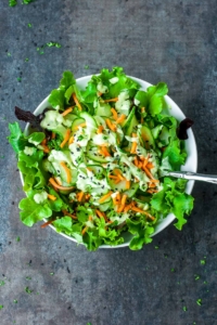 This wasabi cucumber avocado dressing is super creamy and full of flavor! Pair it with a spiralized cucumber and carrot salad for a delicious vegan dish that'll shake up your salad game!