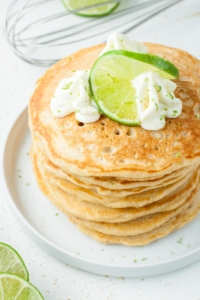 Ultra fluffy and bursting with flavor, these tasty Key Lime Pie Pancakes are guaranteed to turn breakfast into the BEST meal of the day!