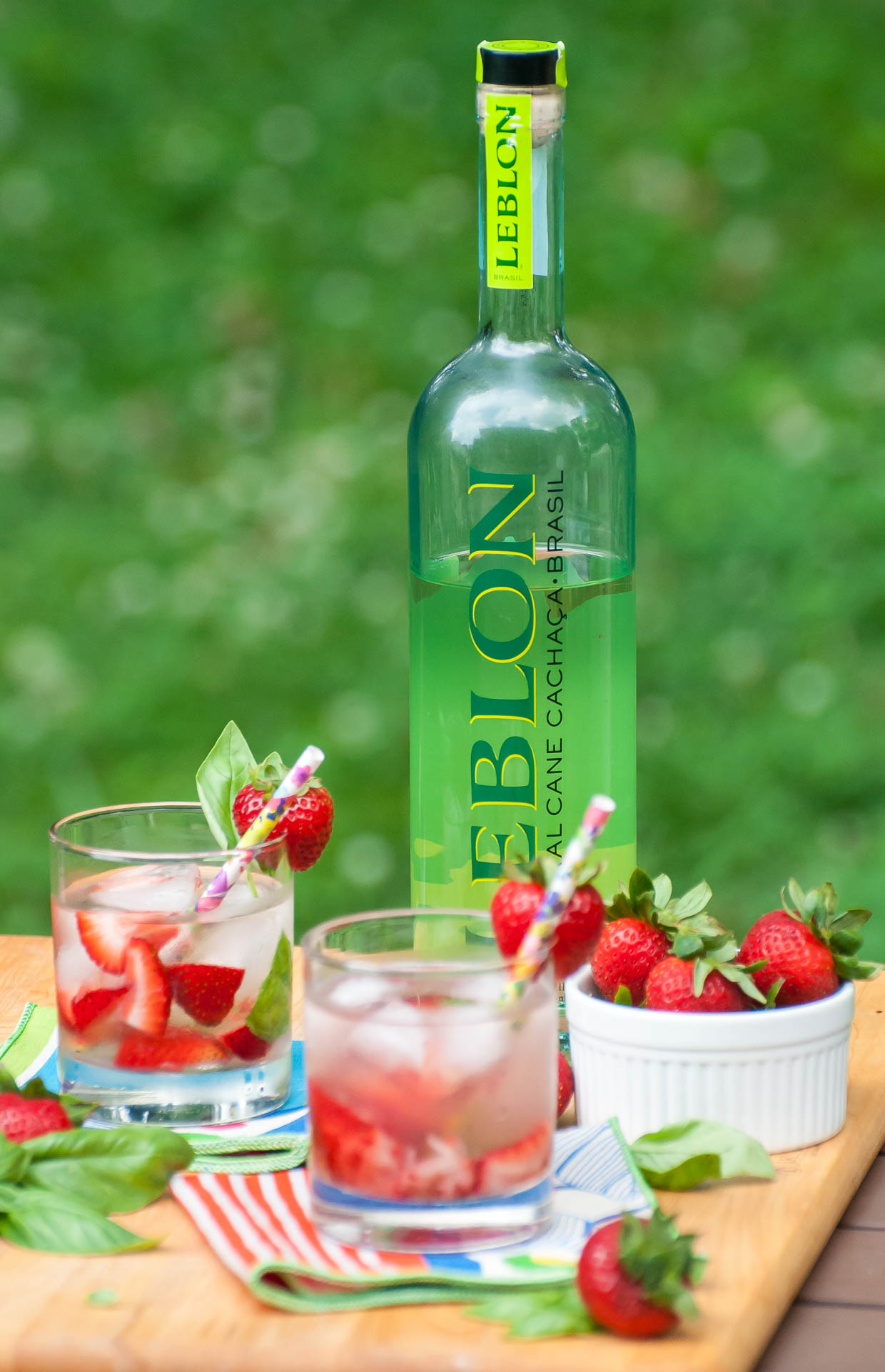 This Strawberry Basil Caipirinha cocktail tastes like Summer in a glass! 