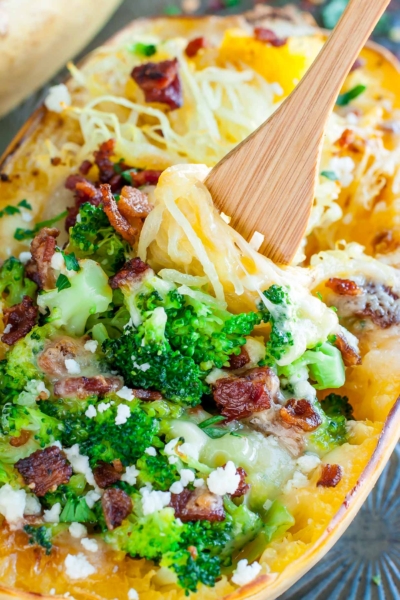 This Cheesy Bacon Broccoli Stuffed Spaghetti Squash is stuffed to the brim with tender broccoli, crispy bacon, and melted cheese.
