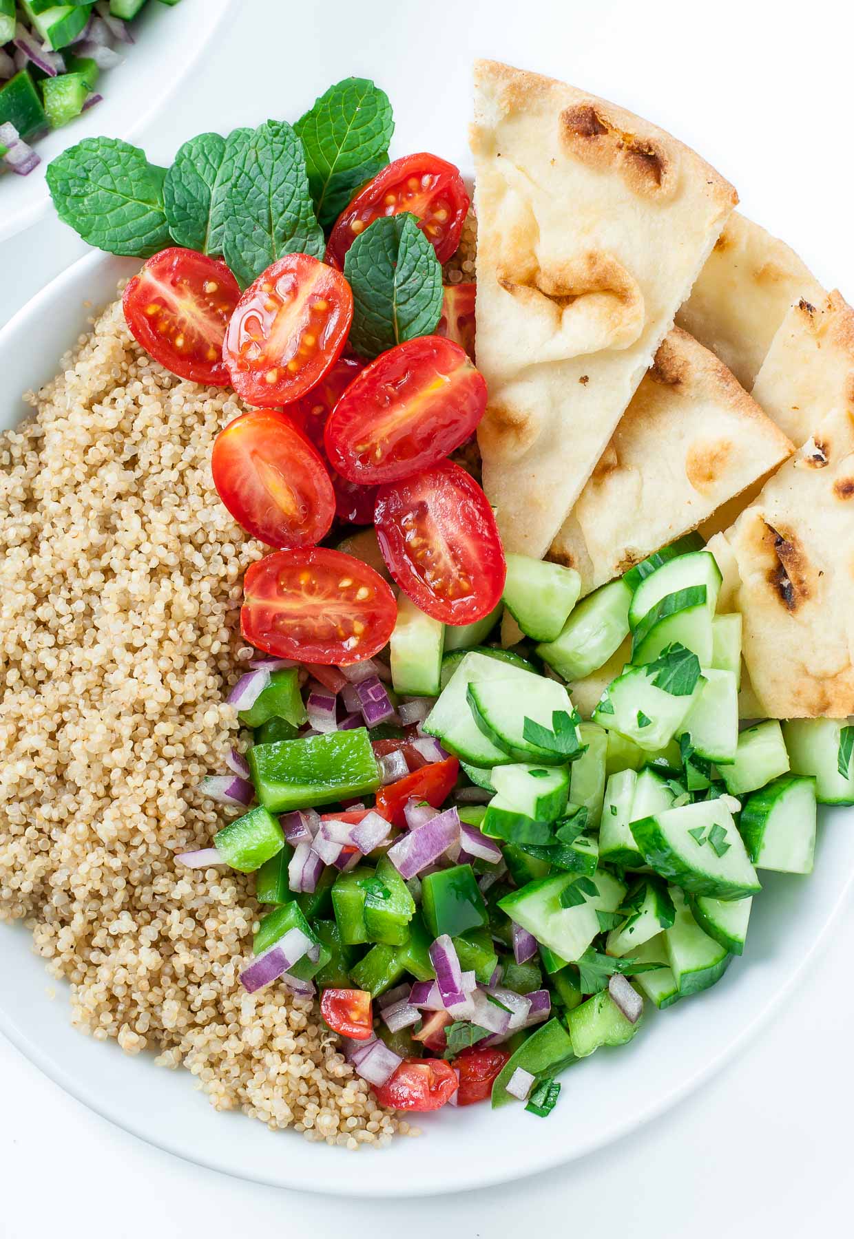 Loving this recipe for healthy Chicken Shawarma Quinoa Bowls with a super easy hack for creating make-ahead meal-prep style lunches for work or school. Vegetarian and Vegan versions available too!