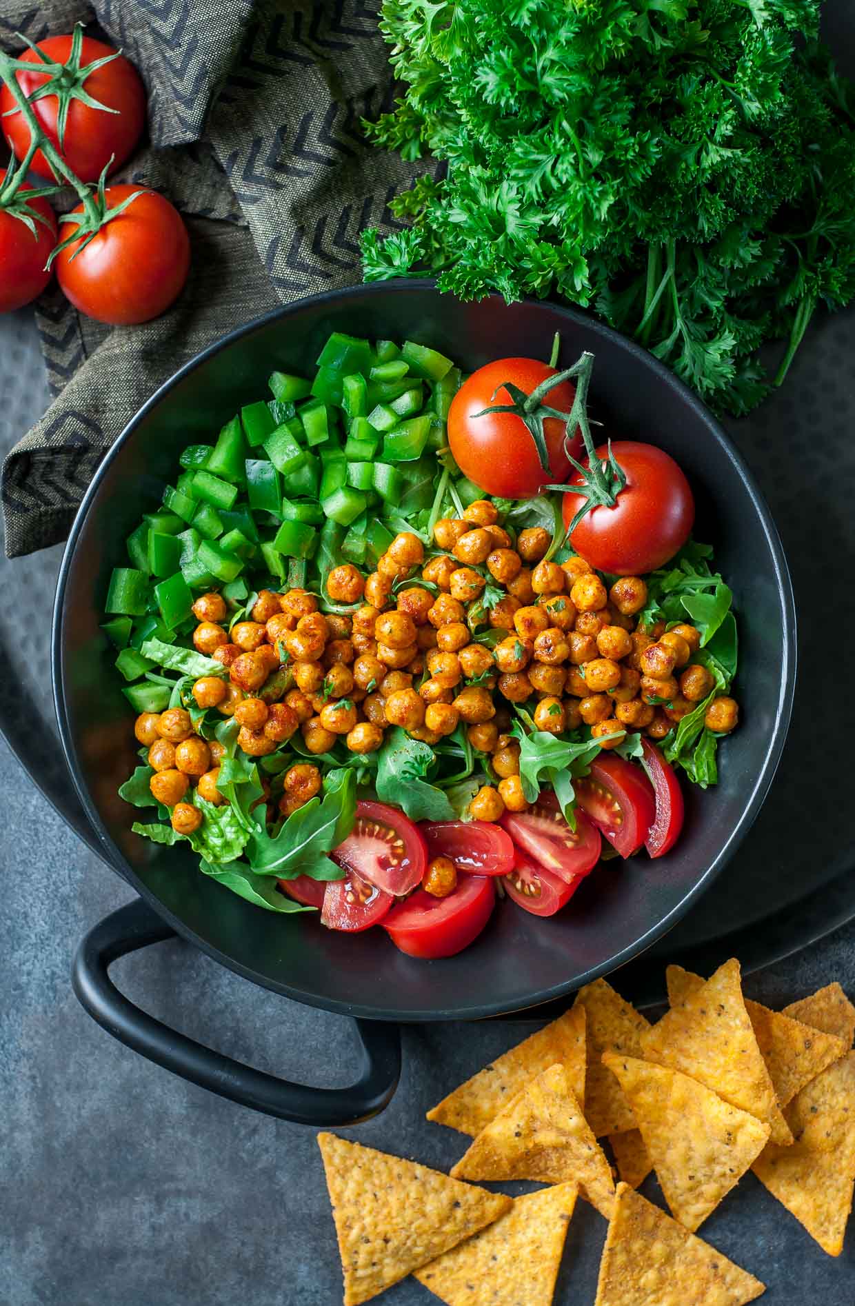 This Buffalo Chickpea Salad is super easy to make, loaded with veggies, and delivers a much needed high-five to the tastebuds. Try it today!