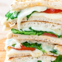 Spinach and Tomato Pita Grilled Cheese