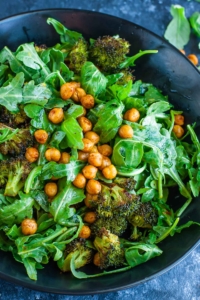 This tasty Roasted Broccoli Chickpea Arugula Salad is tossed with a healthy homemade lemon dressing and ready to rock your salad game!
