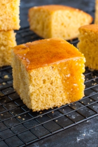 Curb those comfort food cravings with a pan of this quick and easy homemade cornbread! This my absolute favorite recipe for fluffy and flavorful cornbread, perfect for dunking in a big bowl of chili!