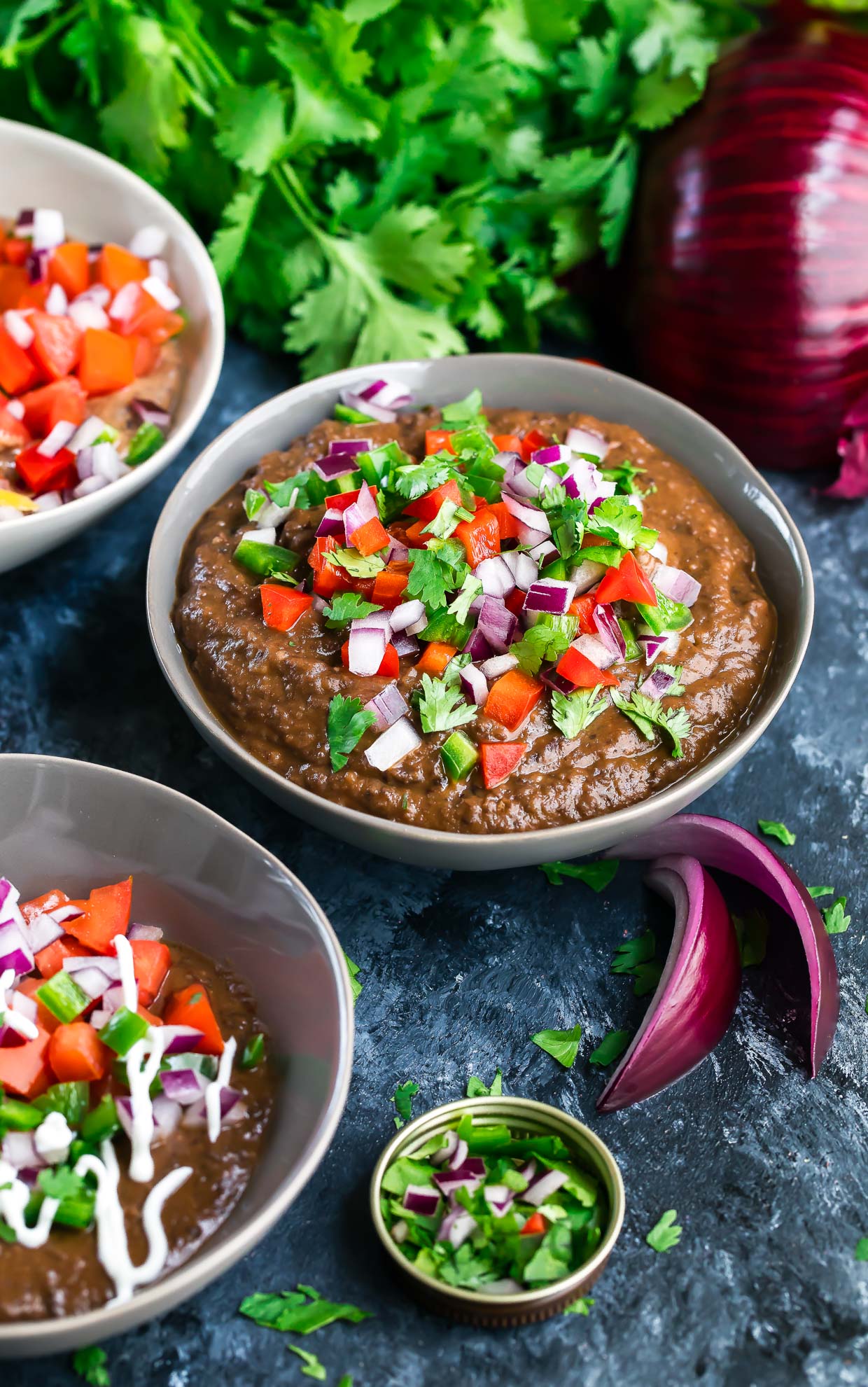 Instant Pot Black Bean Dip is a total breeze to throw together! No cans needed! Simply grab a bag of dried beans and get ready for a party-perfect vegetarian dip that's easy, make-ahead, and SO delicious!