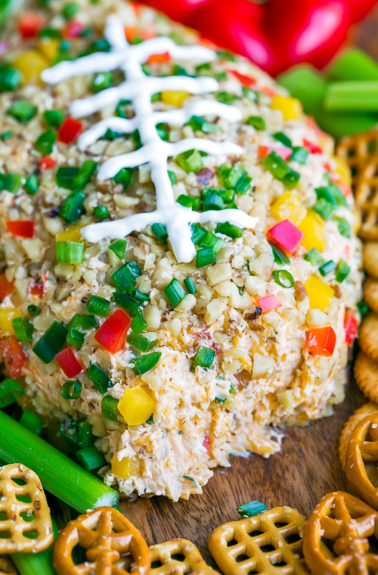 You're guaranteed touchdown status at your next game day party with this Buffalo Ranch Football Cheese Ball! This crazy easy appetizer can be made in advance and is portable and DELICIOUS!