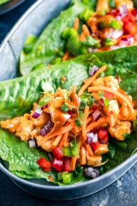 These spicy Buffalo Shrimp Lettuce Wrap Tacos are fast, flavorful, and ready to Taco Tuesday your face off! Each tasty taco is gluten-free, paleo and Whole30 friendly too!