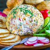 A super fun way to serve bagels and cream cheese, this Veggie Cream Cheese Breakfast Cheese Ball will jazz up your brunch game with little effort! This tasty veggie-packed cream cheese can be made the night before for a make-your-own-bagel spread for family and friends!