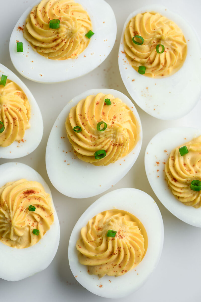 Close-Up of Deviled Eggs with Paprika and Scallions