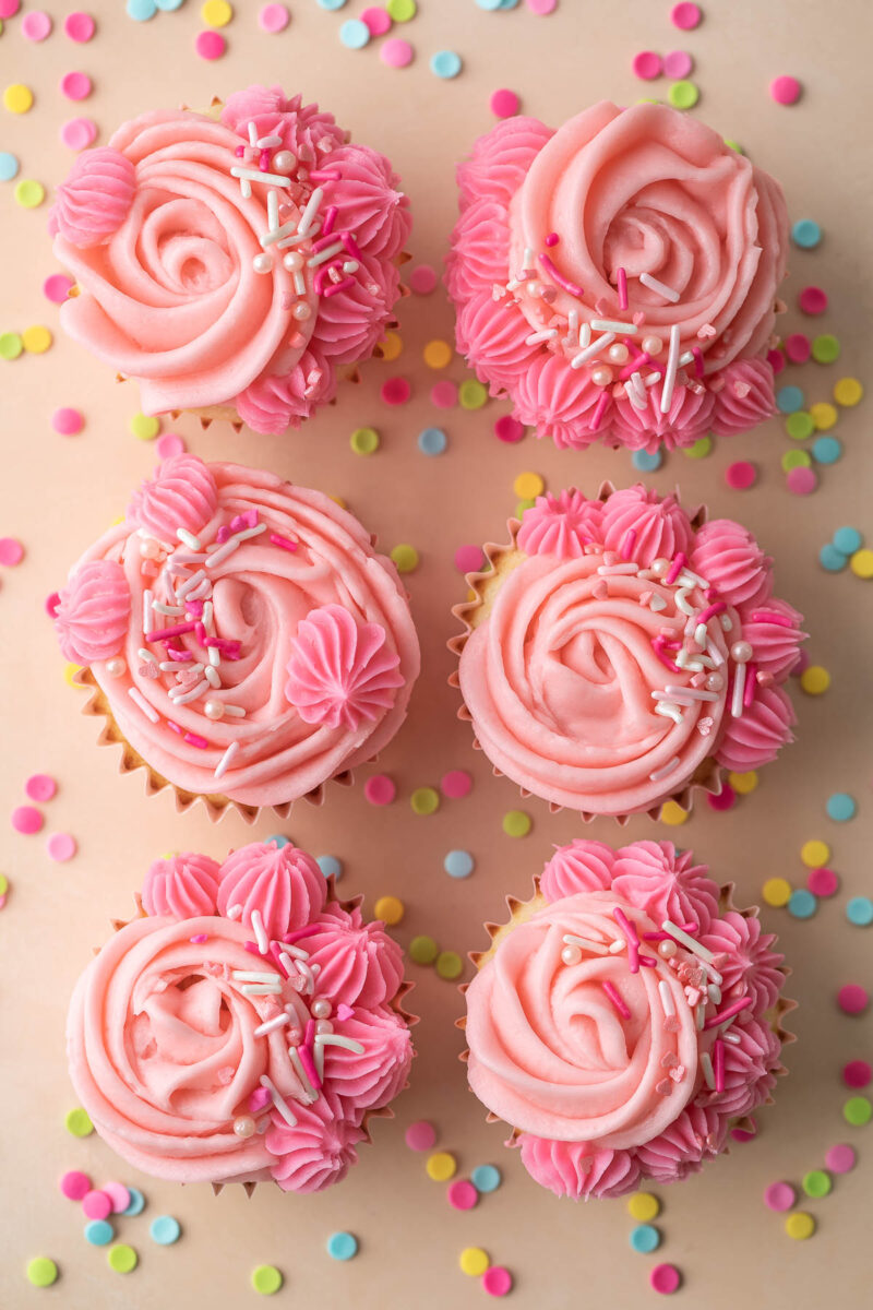 Six Small Batch Valentine Cupcakes with Pink Frosting and Sprinkles