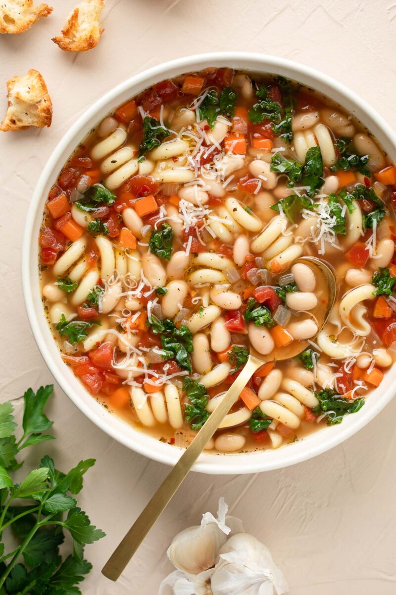 White Bean Noodle Soup Bowl with Parmesan and Kale