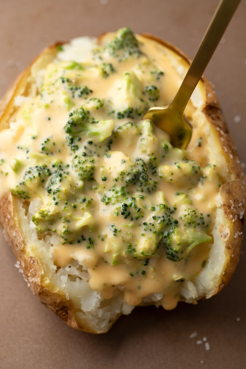 Cheesy Broccoli Cheddar Sauced Baked Potato