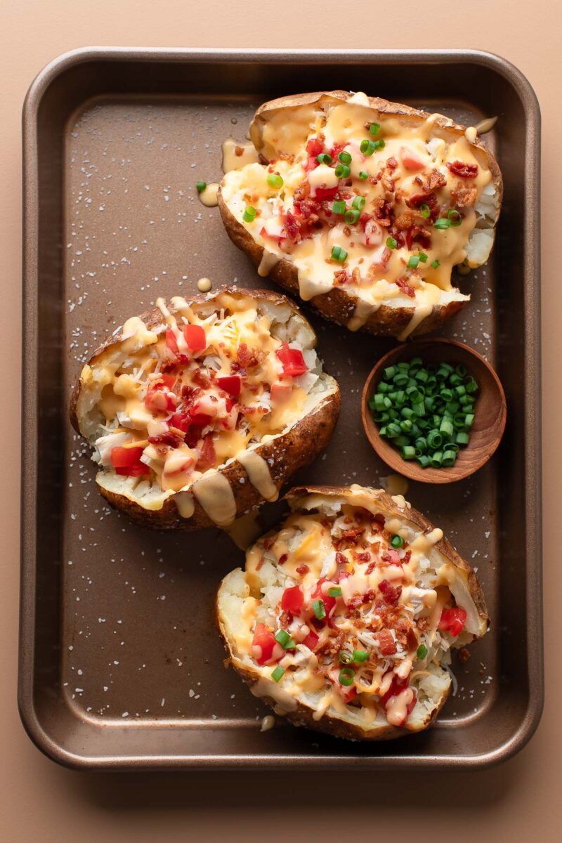 Cheesy Loaded Baked Potatoes with Chicken and Bacon