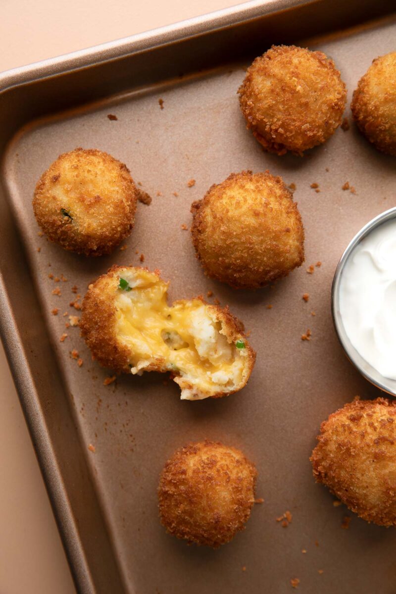 fried mashed potato balls with melty cheesy center