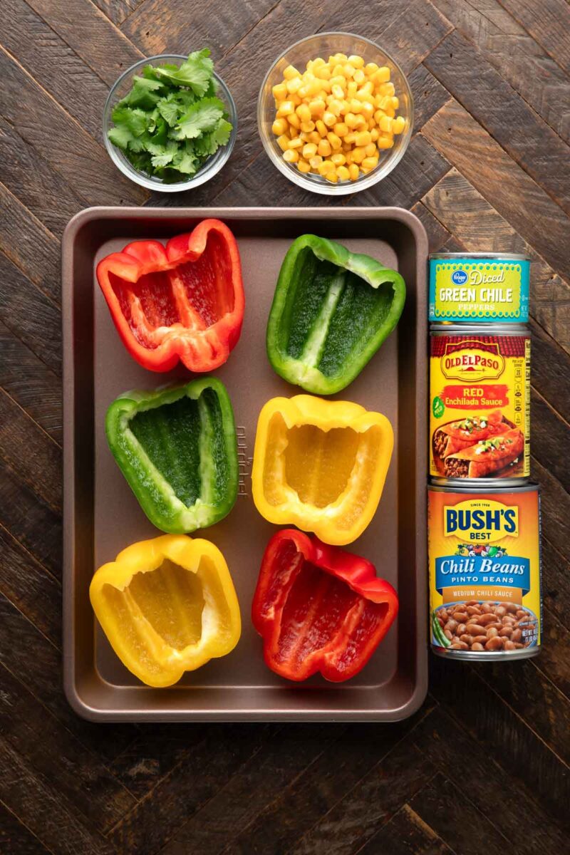 multi colored bell peppers, corn, cilantro, green chiles, red enchilada sauce, and chili beans